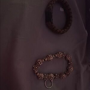 Bracelet with Floral Design one on bottom is a keychain top is bracelet